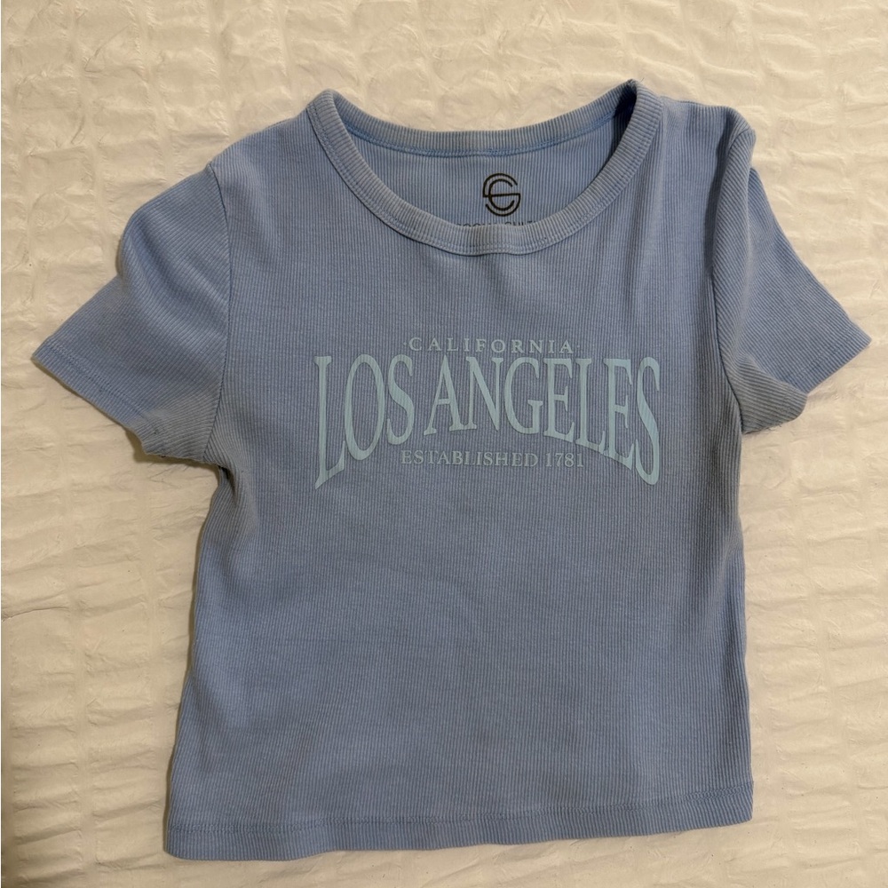 blue top with a brown tint! size M